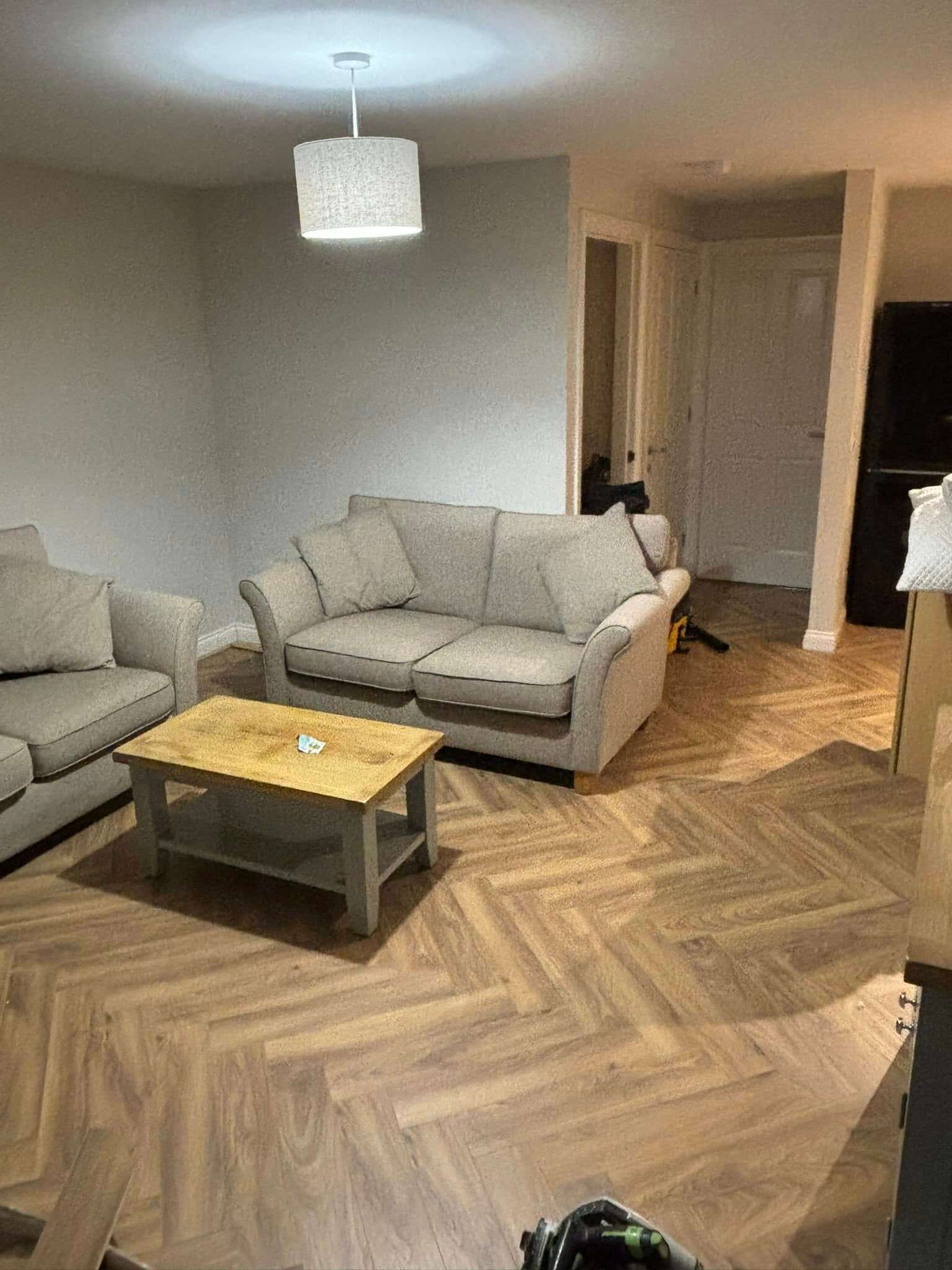 Finished Herringbone Flooring Installation in a Morecambe Living Space